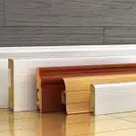Comment réussir la pose des plinthes en bois