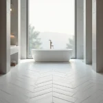 Carrelage en chevron blanc et gris posé en longueur dans une salle de bain étroite pour agrandir l'espace visuellement